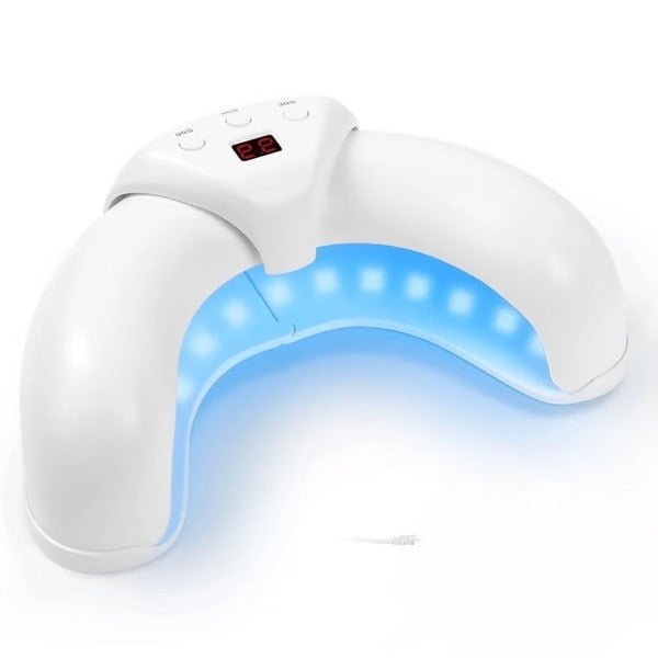Compact laser therapy device treating nail fungus at home. Promotes healthy, clear nails and improved foot care.