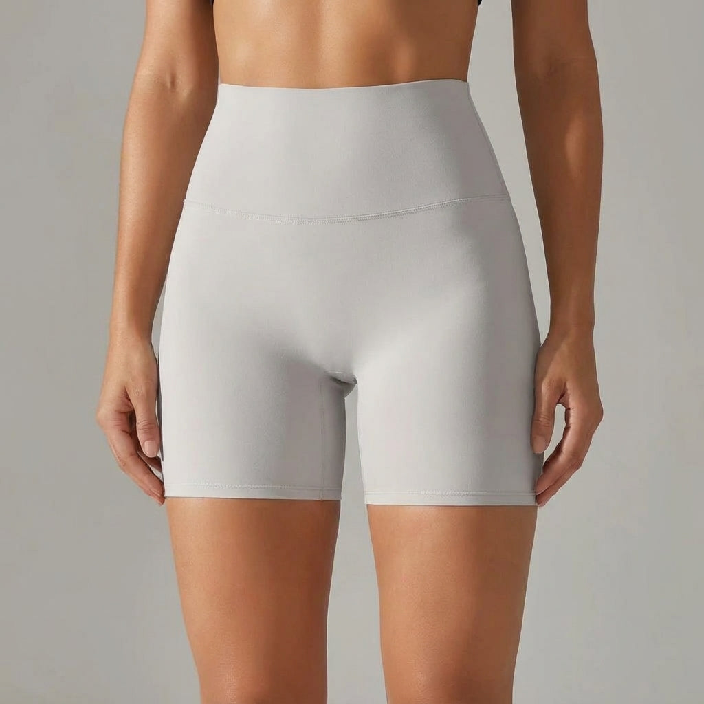 Pair of black seamless high-waisted shorts for women, essential activewear for training.