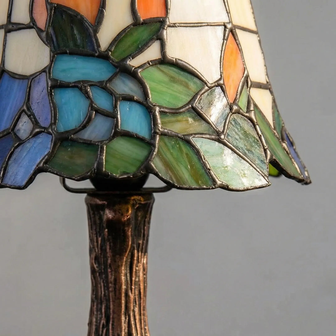 Elegant Aurafleur stained glass table lamp, providing warm LED light as home decor