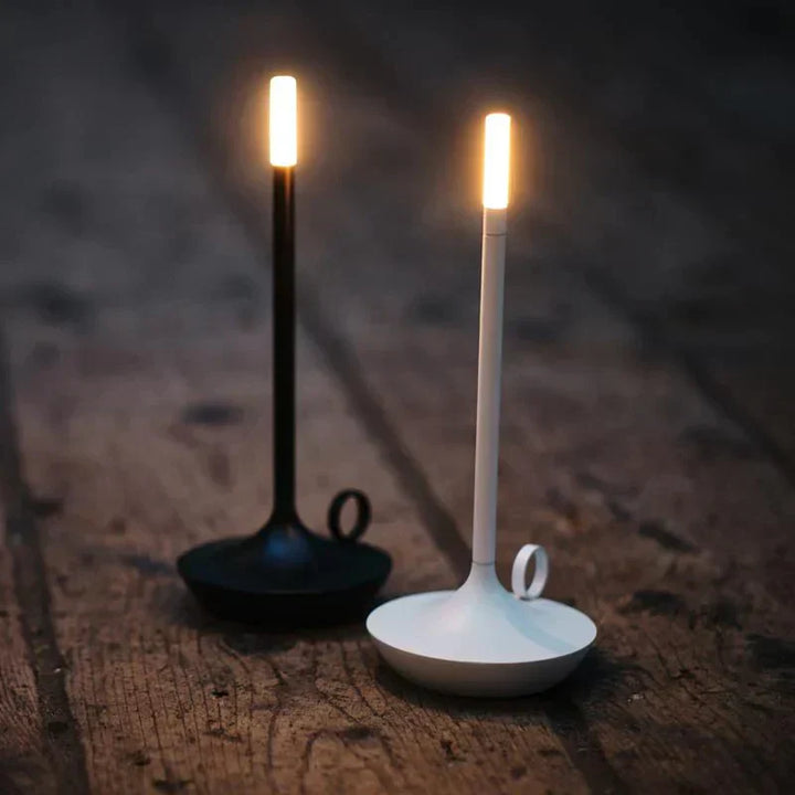 Rechargeable Aurelia LED lamp with touch controls for easy dimming, a modern home accent.