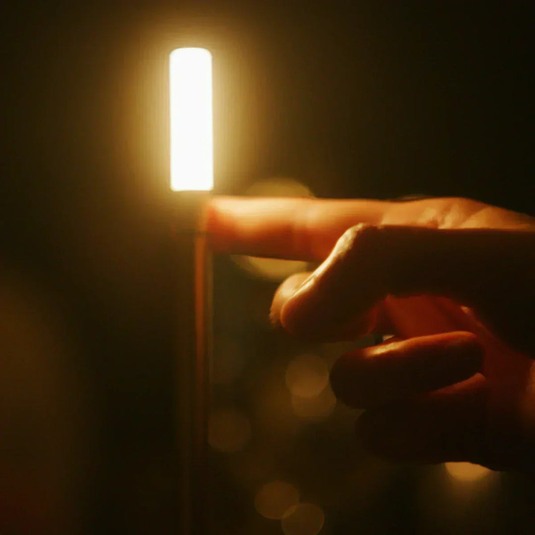 Close-up of the Aurelia modern table lamp, highlighting its elegant LED lighting and design.