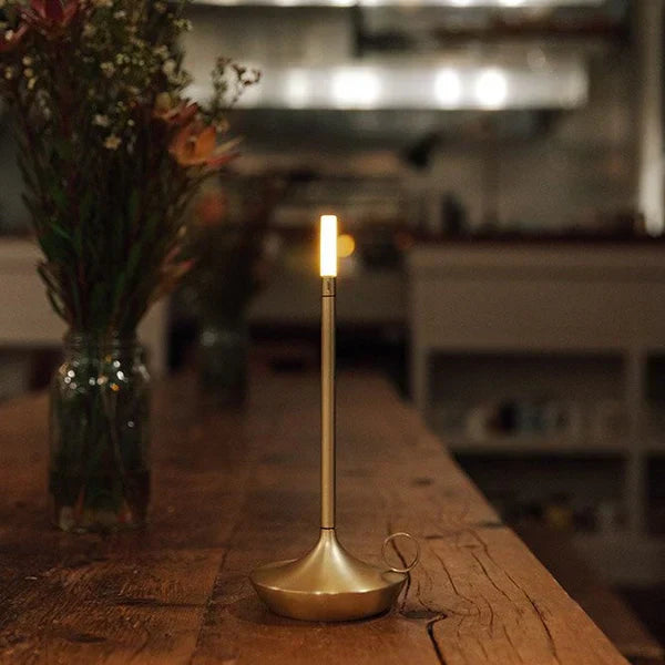 Stylish Aurelia LED table lamp, a versatile dimmable lighting solution for modern spaces.