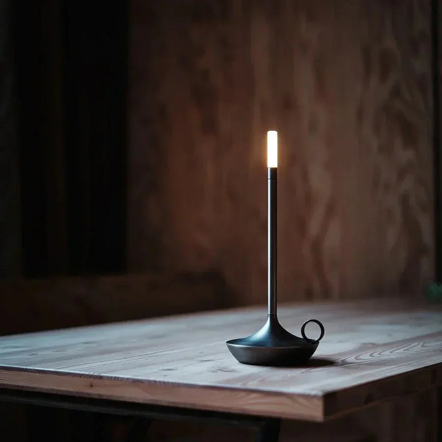 Aurelia modern LED table lamp from a different angle, emphasizing its unique form.