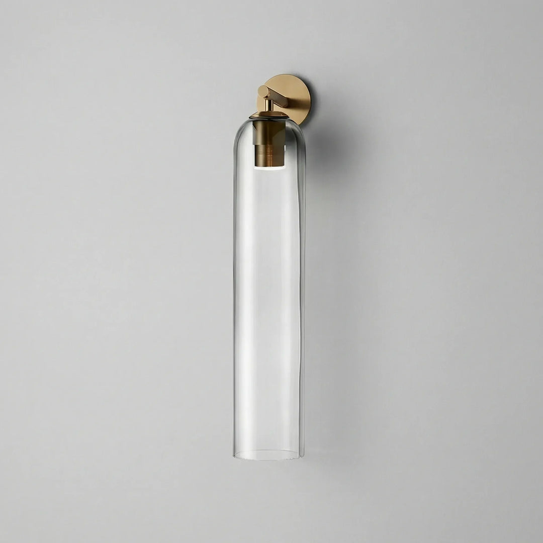 Close-up of Aurelis vertical glass wall sconce showcasing its modern design and diffused light effect