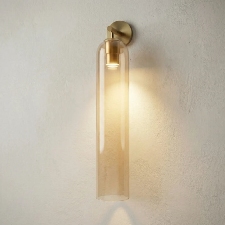 Aurelis vertical glass wall sconce illuminating a stylish hallway, offering elegant and ambient lighting
