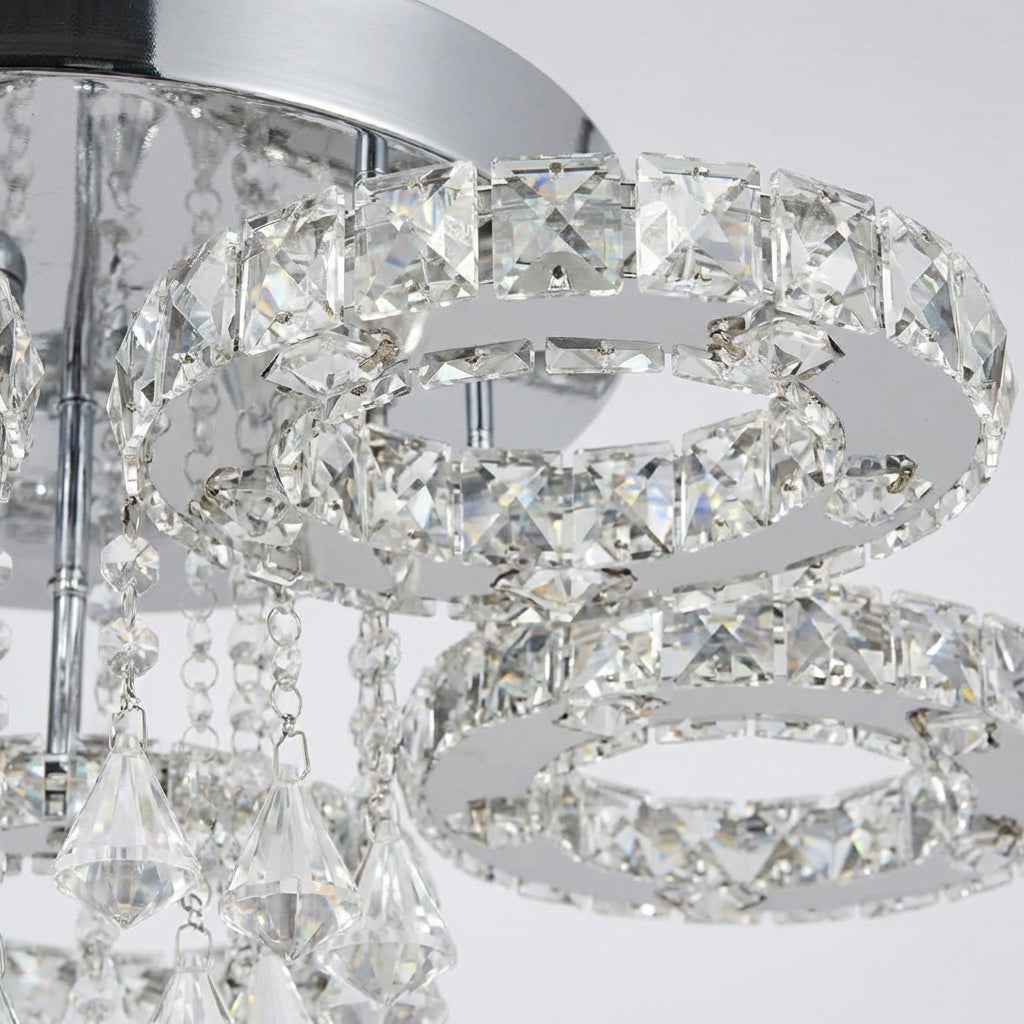 Close-up of Aurellin crystal chandelier, stainless steel frame, luxury lighting