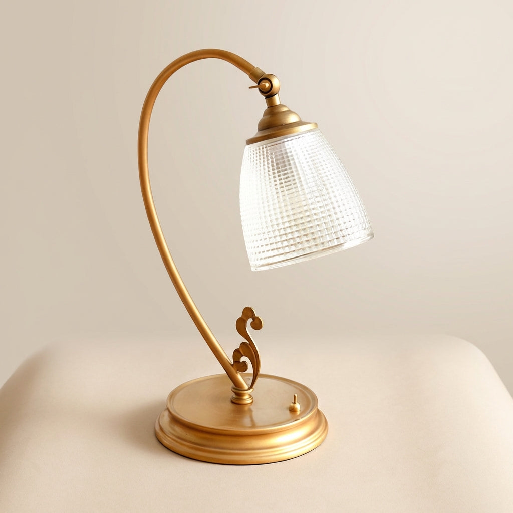 Elegant Aurelyne vintage inspired curved table lamp, showcasing its unique design and warm home decor appeal.