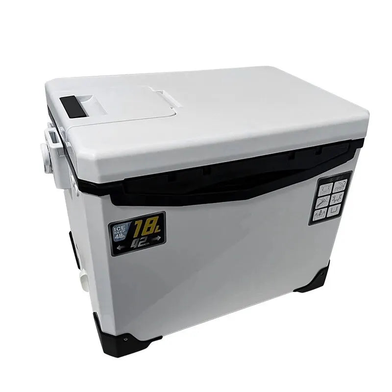Angler proudly displaying freshly caught fish next to an open Auren insulated fishing cooler box, ice chest.