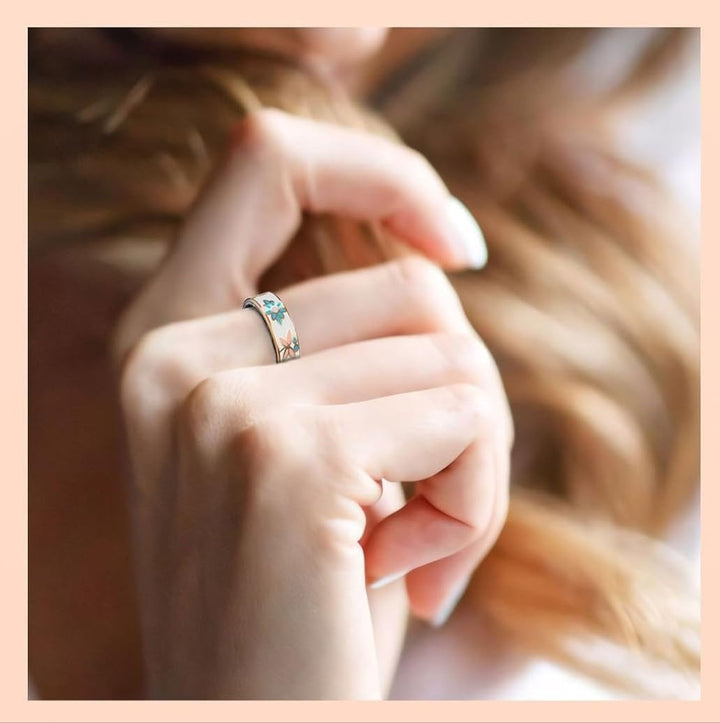 Close-up of Aurina Smart Ring, black enamel, with health tracking features