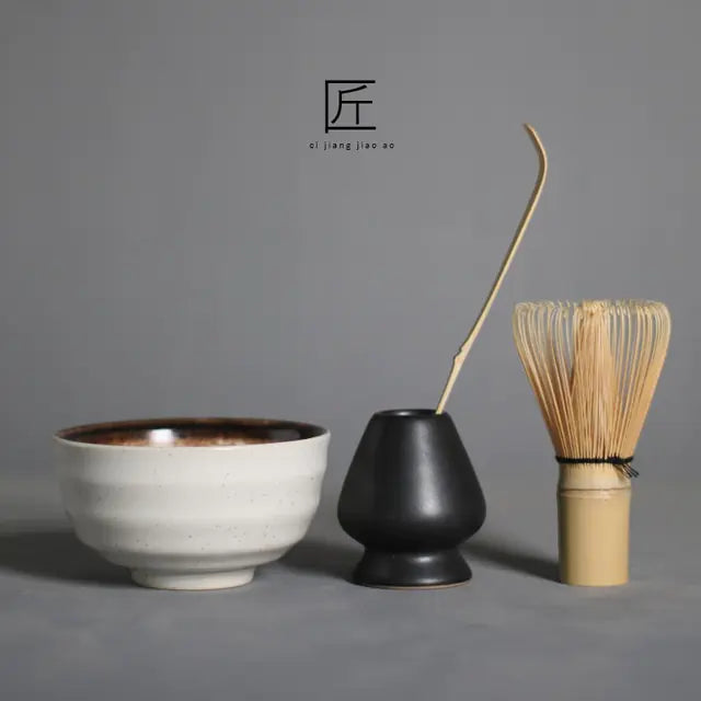 Detailed bamboo matcha whisk (chasen) for frothing green tea, part of an authentic tea ceremony gift set.