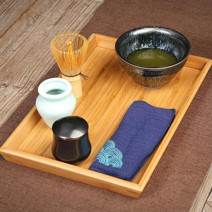 Traditional matcha tea set for authentic green tea. Includes ceramic bowl, bamboo whisk & scoop. Eco-friendly kitchenware.