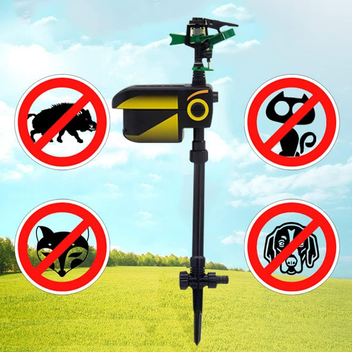 Motion-activated water sprinkler repelling garden pests. Automatic outdoor animal deterrent for yard protection.