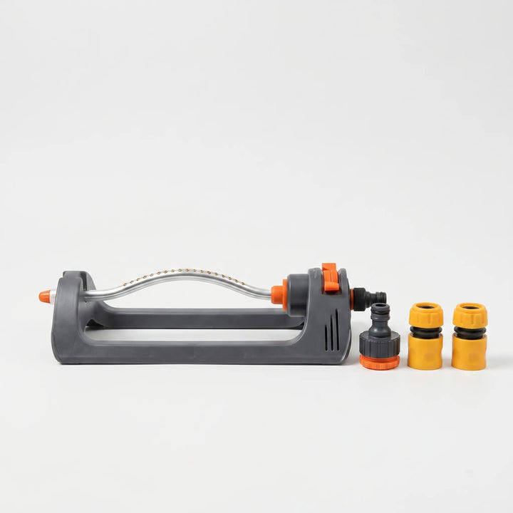 Easy-to-connect oscillating water sprayer, a reliable hose attachment for automatic and thorough garden watering.