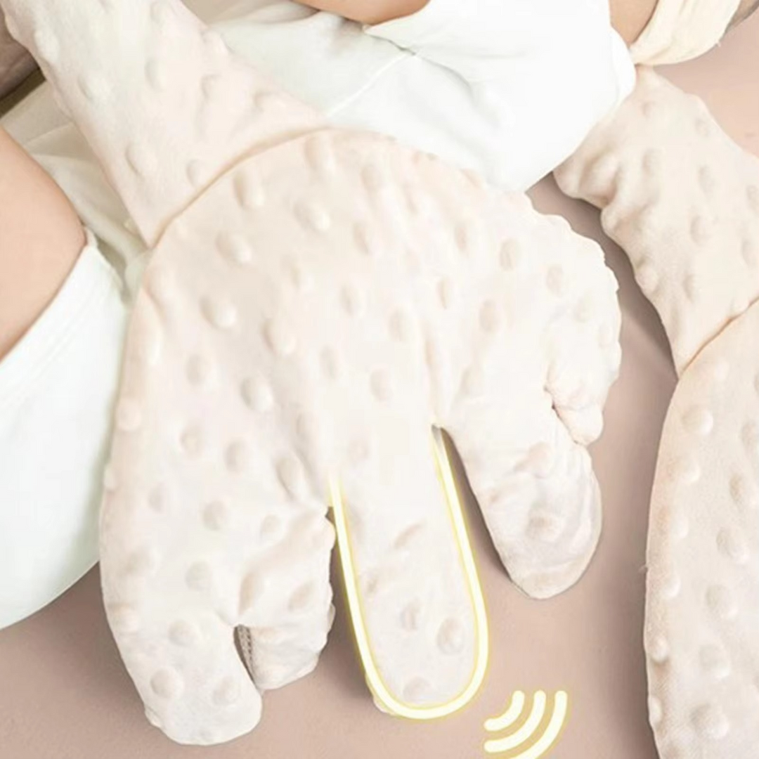 Baby comforter pillow with automatic soothing features for infant sleep support.