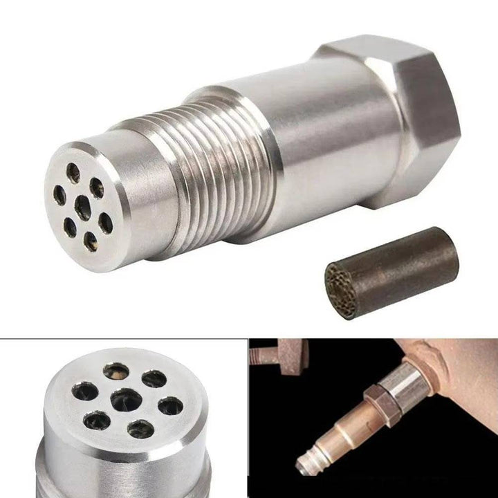 Automotive O2 sensor CEL fix adapter with mini catalytic converter for check engine light elimination.