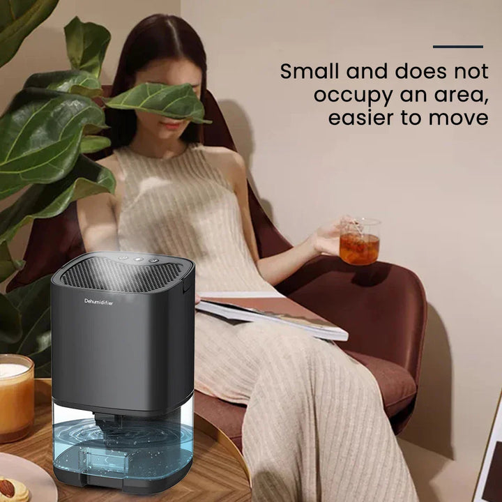 The Aveline 1000ml dehumidifier on a bedside table, acting as an odor eliminator and night light.