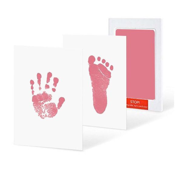 Personalized baby handprint and footprint art displayed in a cozy nursery, cherished memory.