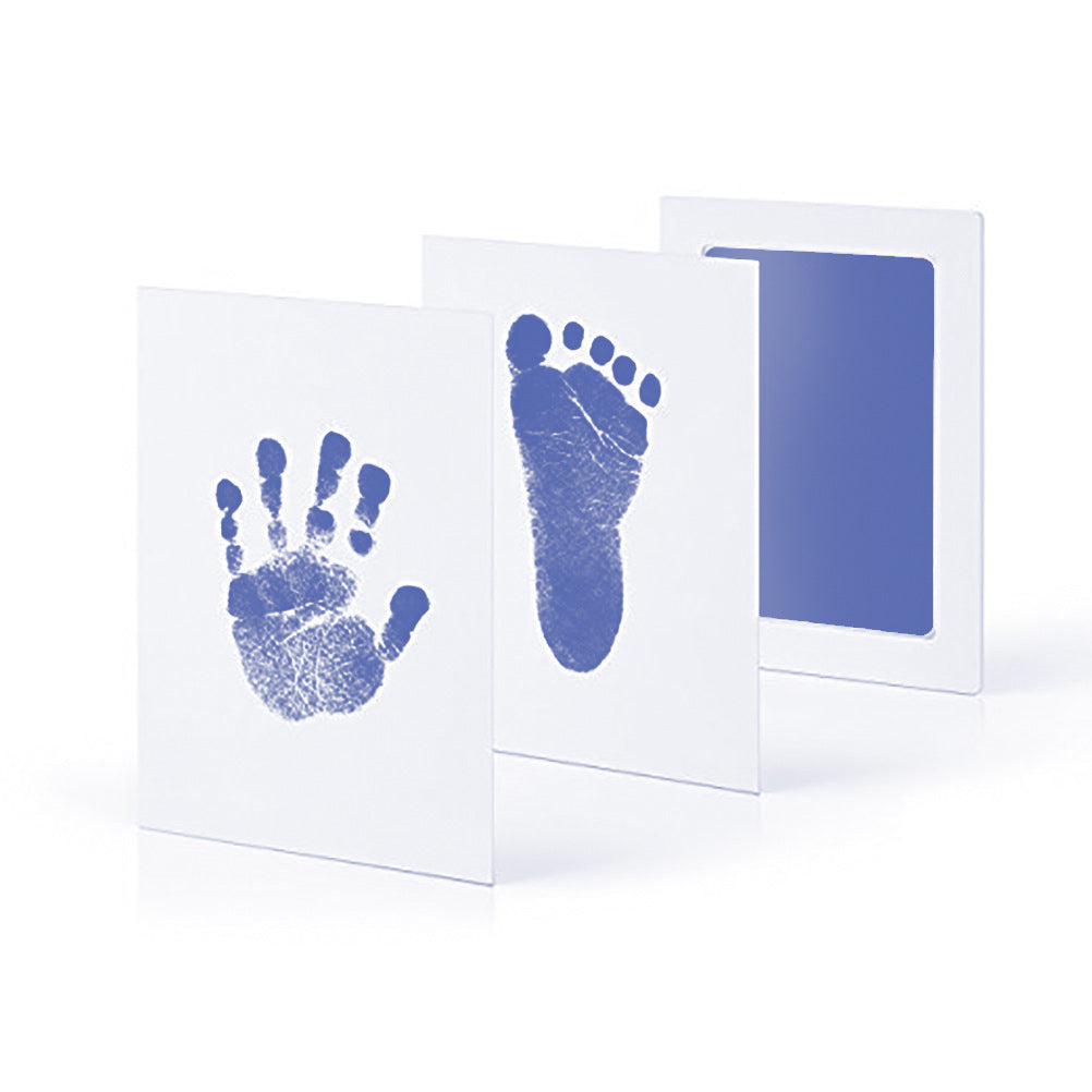Capturing baby's first precious memories with a mess-free ink handprint and footprint kit.