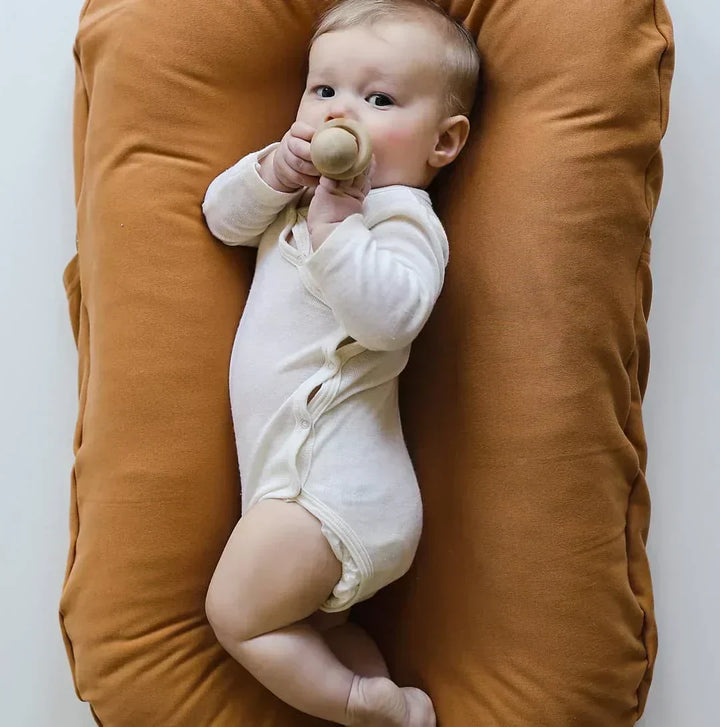 Portable baby lounger, lightweight infant nest for travel & naps anywhere. Acts as a mini portable crib.