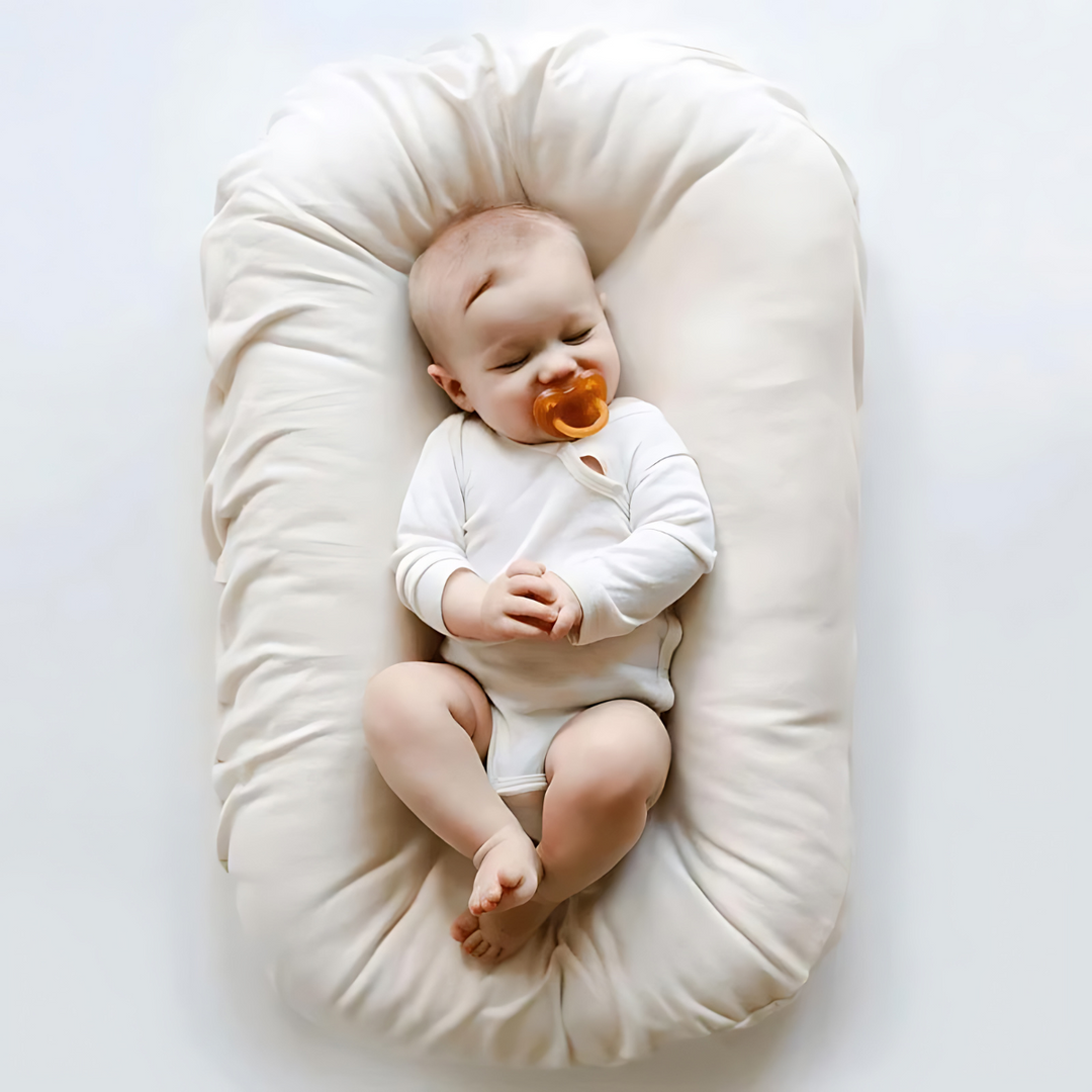 Neutral decor baby lounger, perfect nursery essential & thoughtful baby gift for new parents.