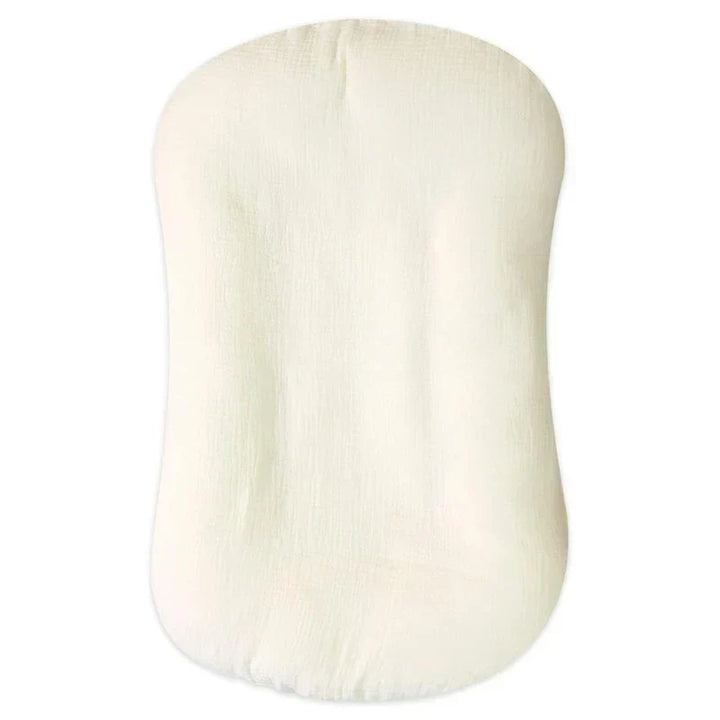 Versatile baby lounger, doubles as an infant nest & portable crib, ensuring baby comfort on the go.