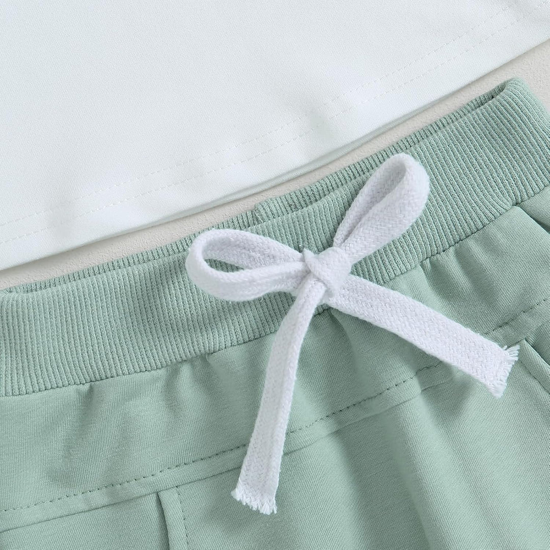 Photo of baby jogger set, contrast sweatshirt and trousers, ready for gifting.