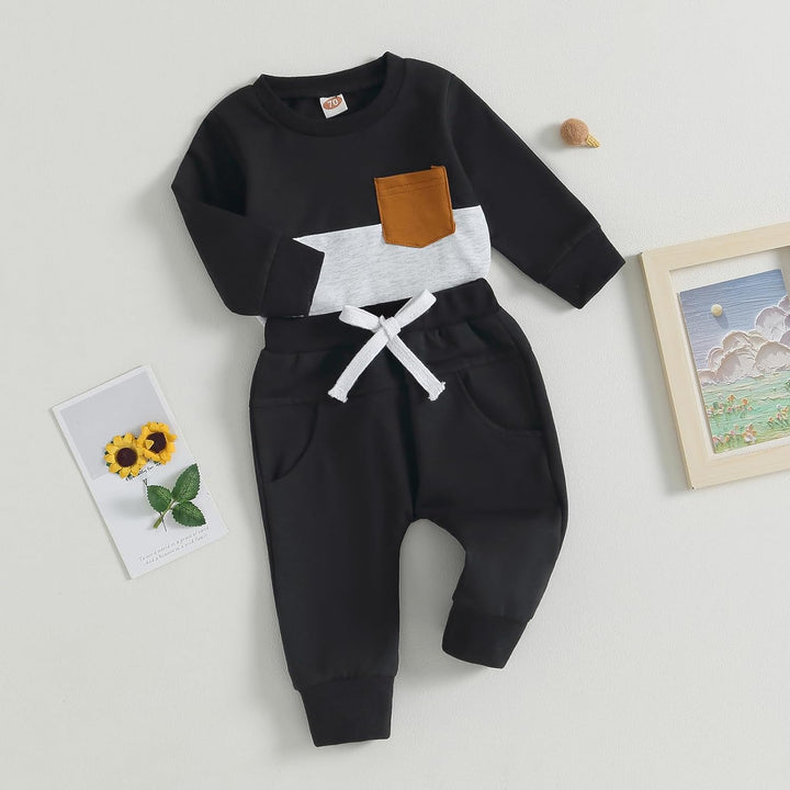 Infant winter fashion: contrast sweatshirt and jogger trousers set, soft cotton blend.