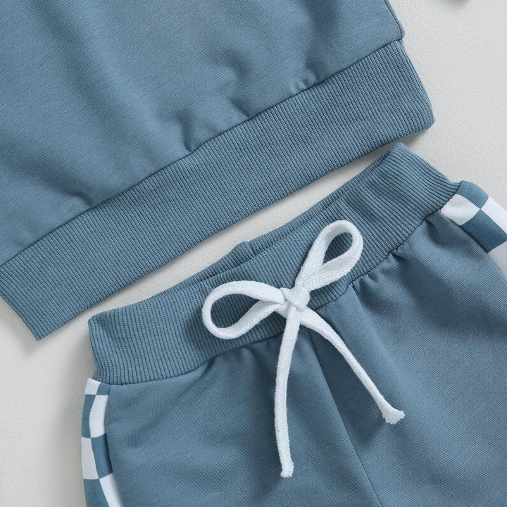 Baby jogger set, contrast design with easy-to-use snap buttons on sweatshirt.