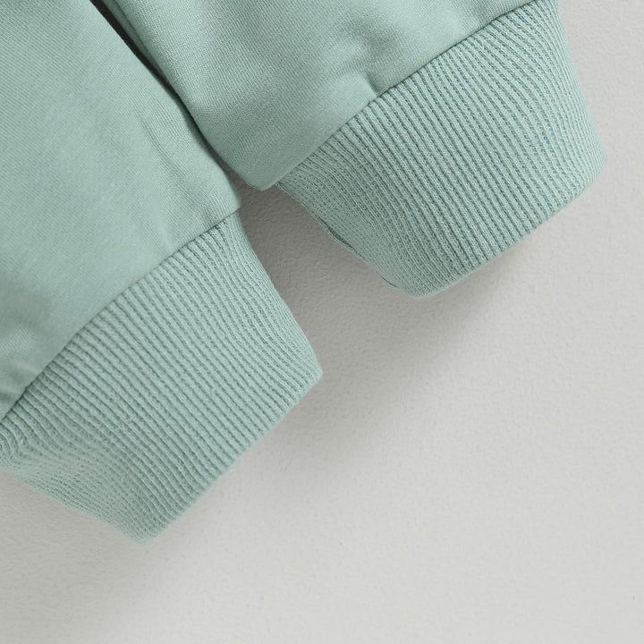 Cozy baby jogger set, contrast fabric, ideal for chilly winter mornings.