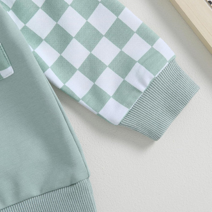 Side profile of baby jogger set, contrast elements highlighted on both pieces.
