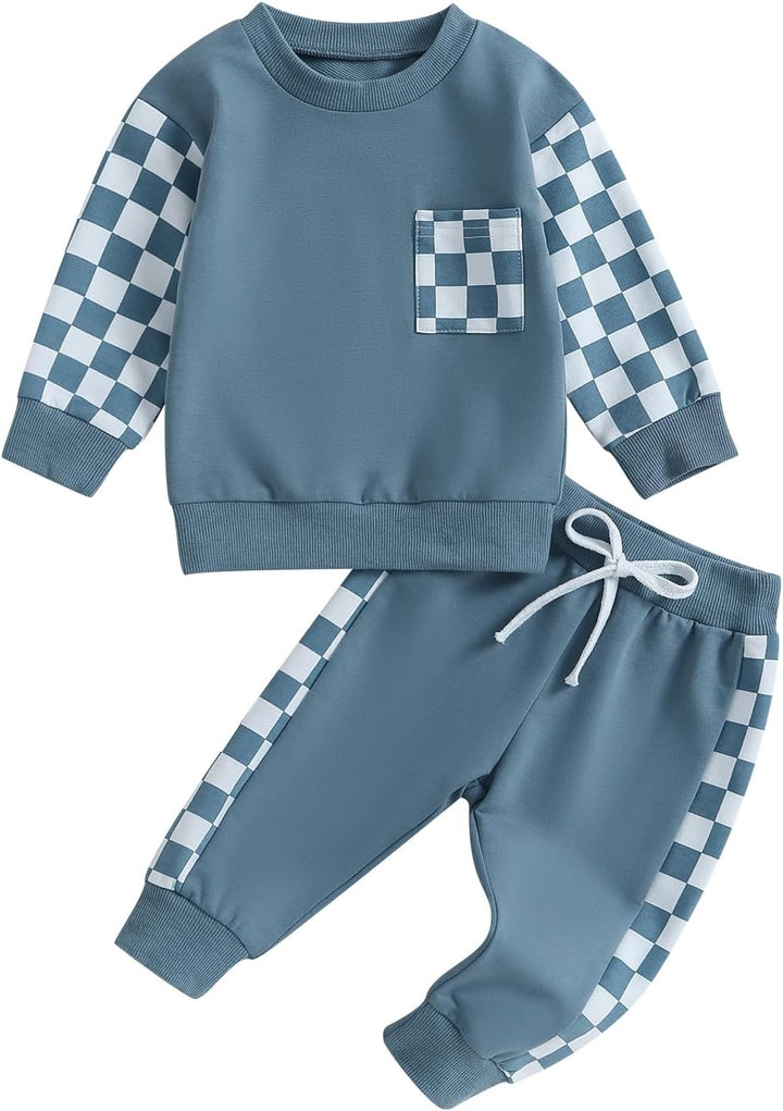 Close-up of baby jogger set, contrast trim on sweatshirt and trousers.