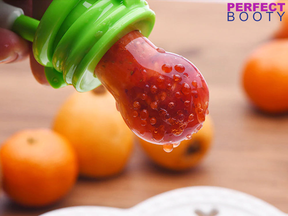BabyBite silicone fruit feeder pacifier, an essential weaning tool for babies starting solid food.