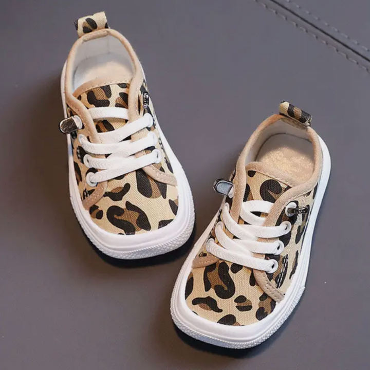 Non-slip, durable kids' ergonomic sneakers, ensuring comfort & healthy natural foot development.