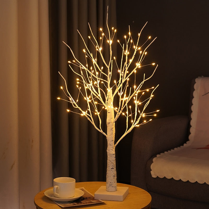 Decorative birch tree lamp glowing with warm LED light, enhancing any Scandinavian-themed room
