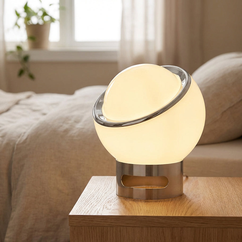 Bauvola minimalist Bauhaus desk lamp with opal glass shade, shedding ambient light on a modern desk
