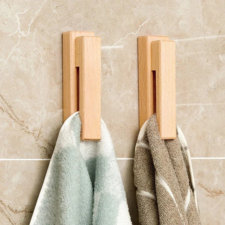 Wall-mounted beech wood towel hook, perfect for hanging hand towels in bathrooms or dishcloths in kitchens.