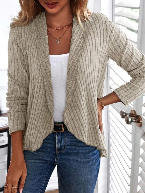 Women's versatile beige long sleeve top, ideal for casual wear or layering. Effortless fitted design with a round neck.