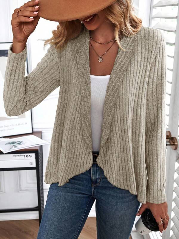Effortless beige long sleeve basic top for women, perfect for versatile casual wear. Fitted round neck everyday style.