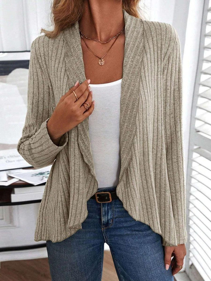Simple beige long sleeve women's top, a basic fitted round neck for everyday and casual layering. Effortless style.