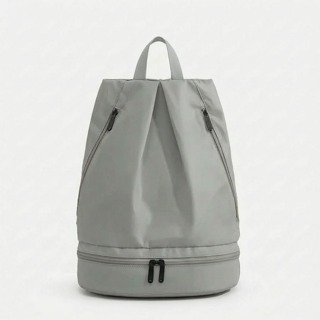 Sleek beige waterproof backpack, a versatile outdoor travel bag & daypack, perfect for any active adventure.