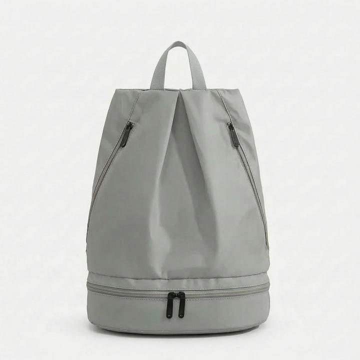Sleek beige waterproof backpack, a versatile outdoor travel bag & daypack, perfect for any active adventure.