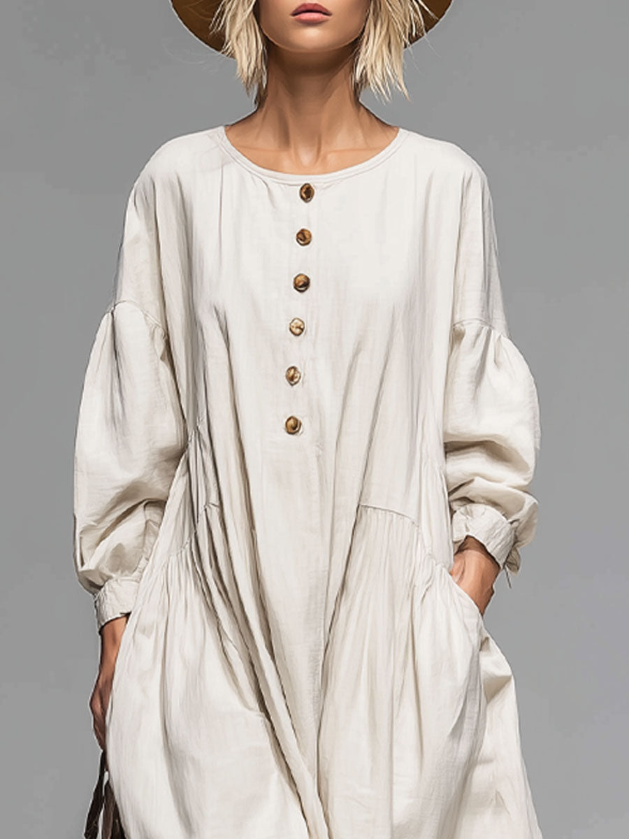Chic women's long sleeve midi dress; loose, button-front design with pockets, perfect for versatile everyday wear.