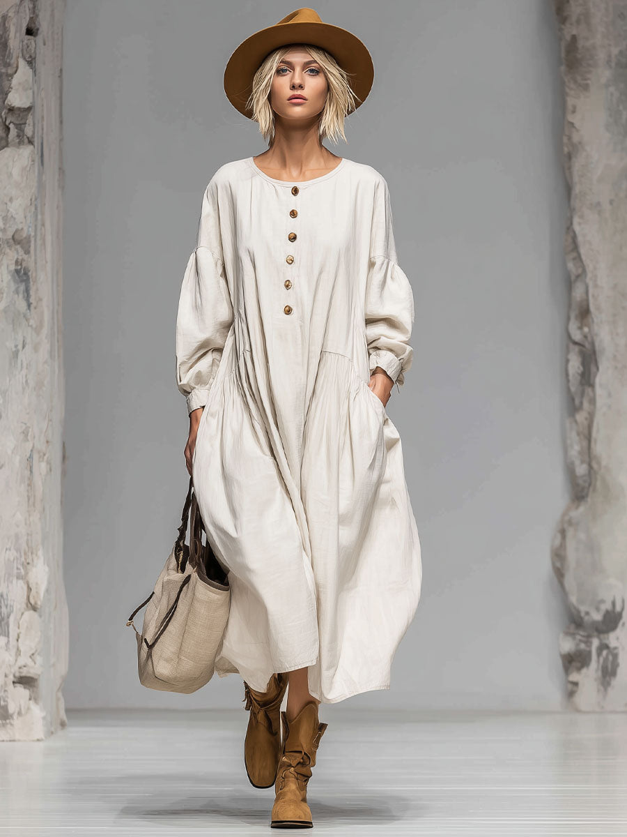 Timeless beige long sleeve midi dress with a loose fit, elegant button-front, and functional pockets for women.