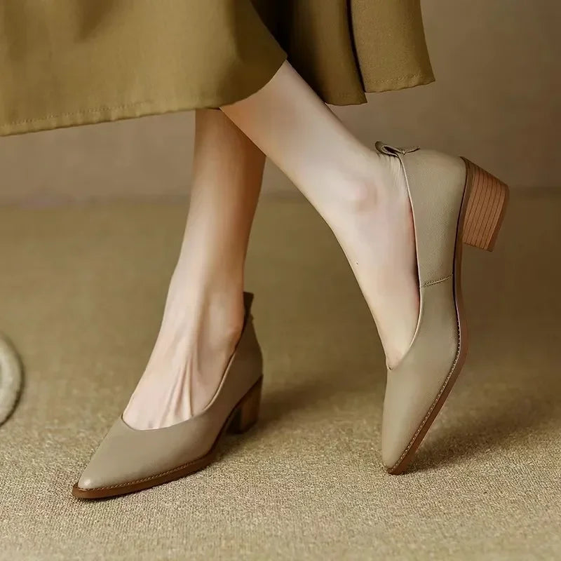 Beige women's pointed toe slip-on block heel court shoes, ideal for professional workwear.