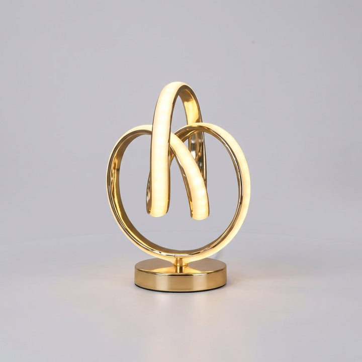 Accent white LED curved table lamp, perfect for desk or nightstand ambient lighting.
