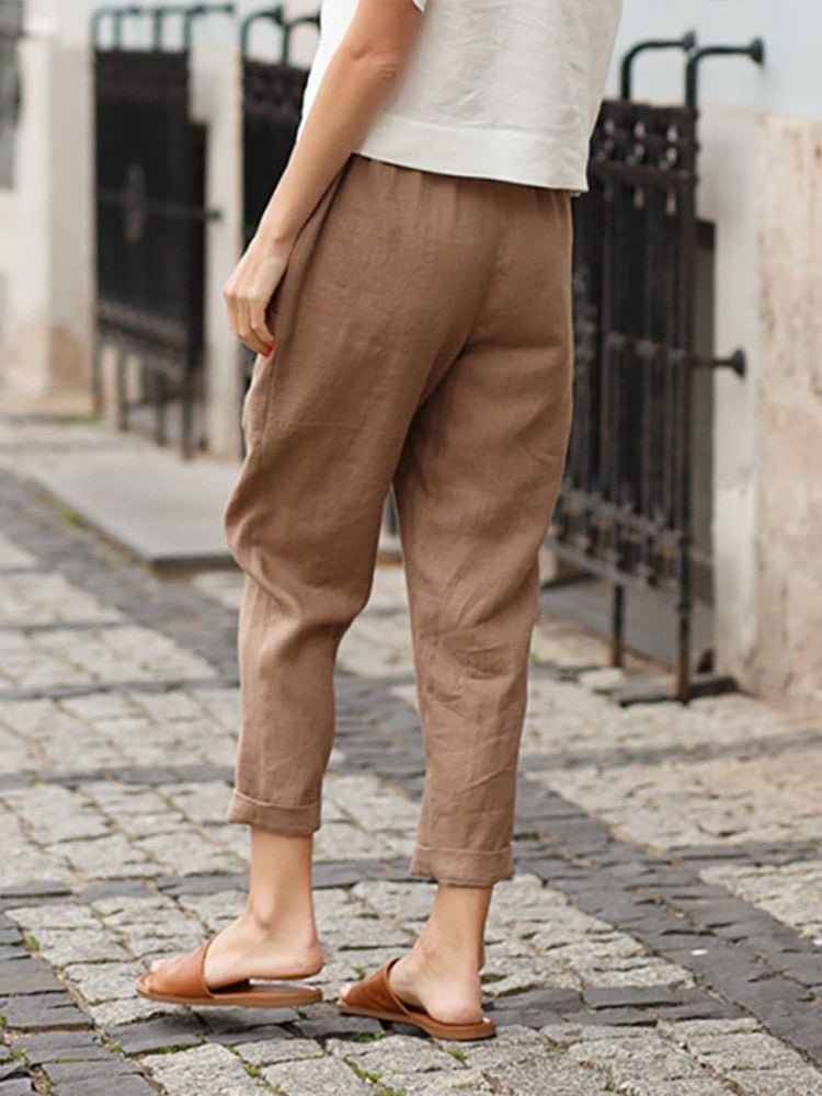 Fashionable relaxed fit trousers for women, ideal for versatile casual & work outfits.