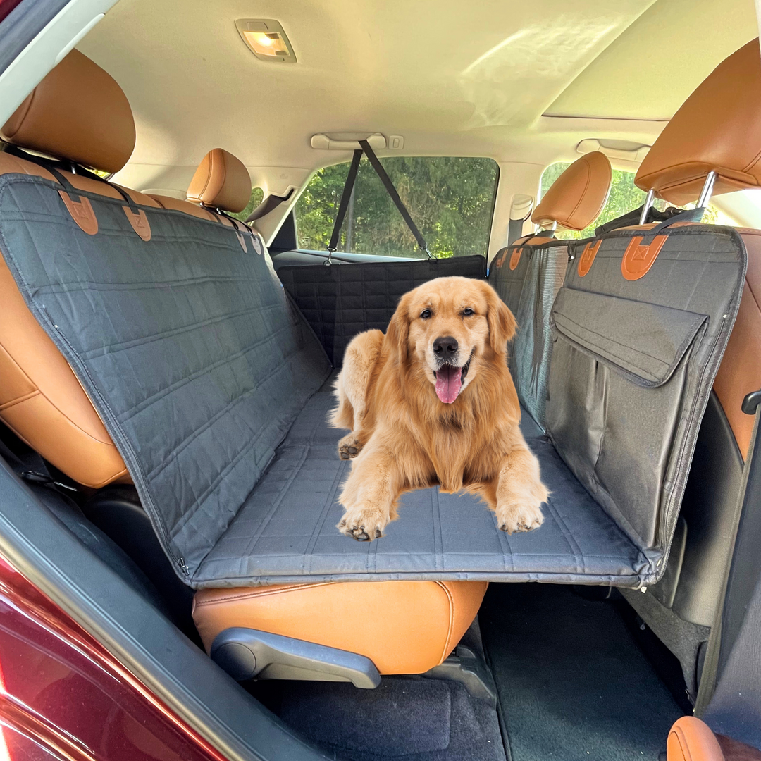 Black dog car accessory: backseat extender with door covers for ultimate pet travel protection.
