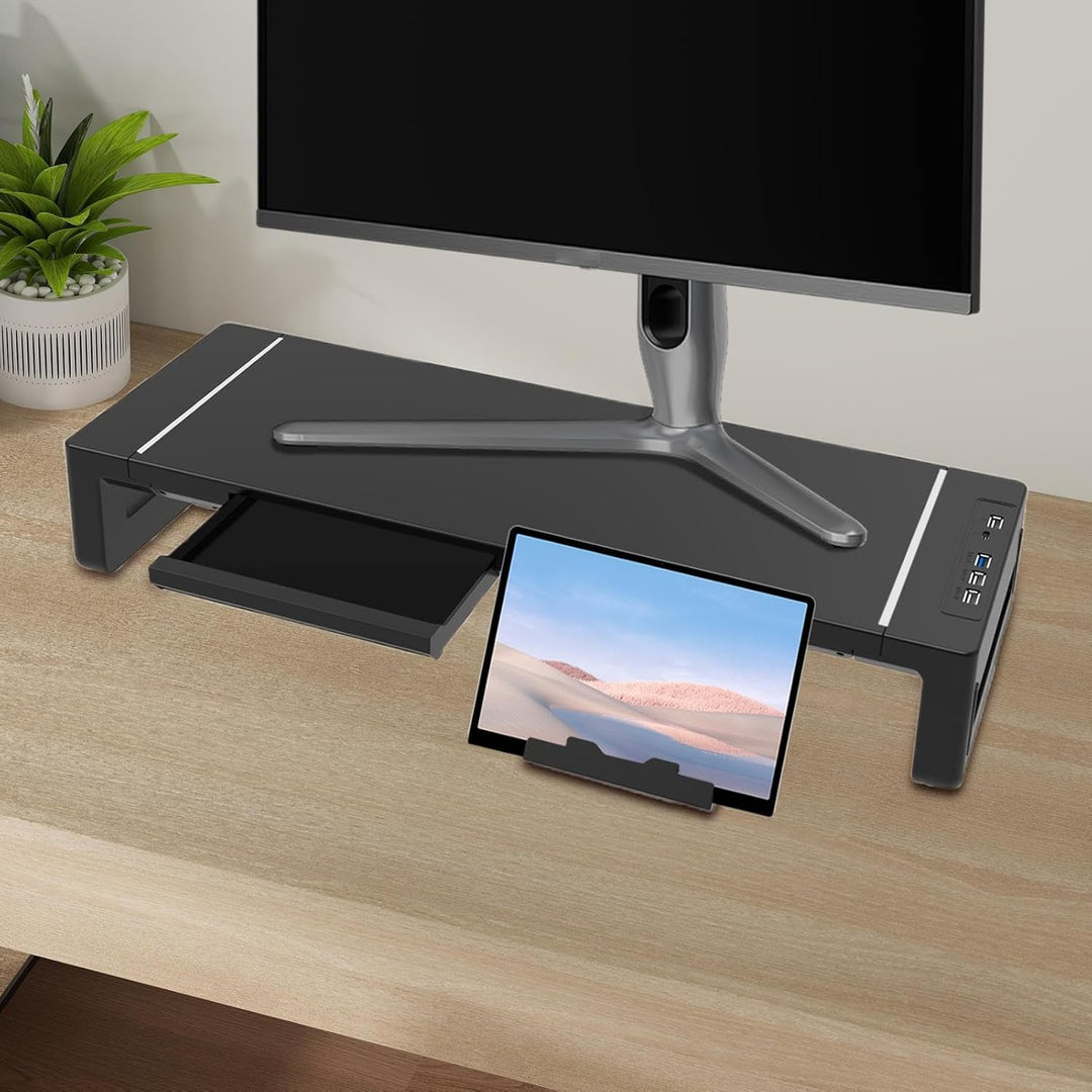 Premium black ergonomic monitor stand with a spacious drawer and USB charging ports