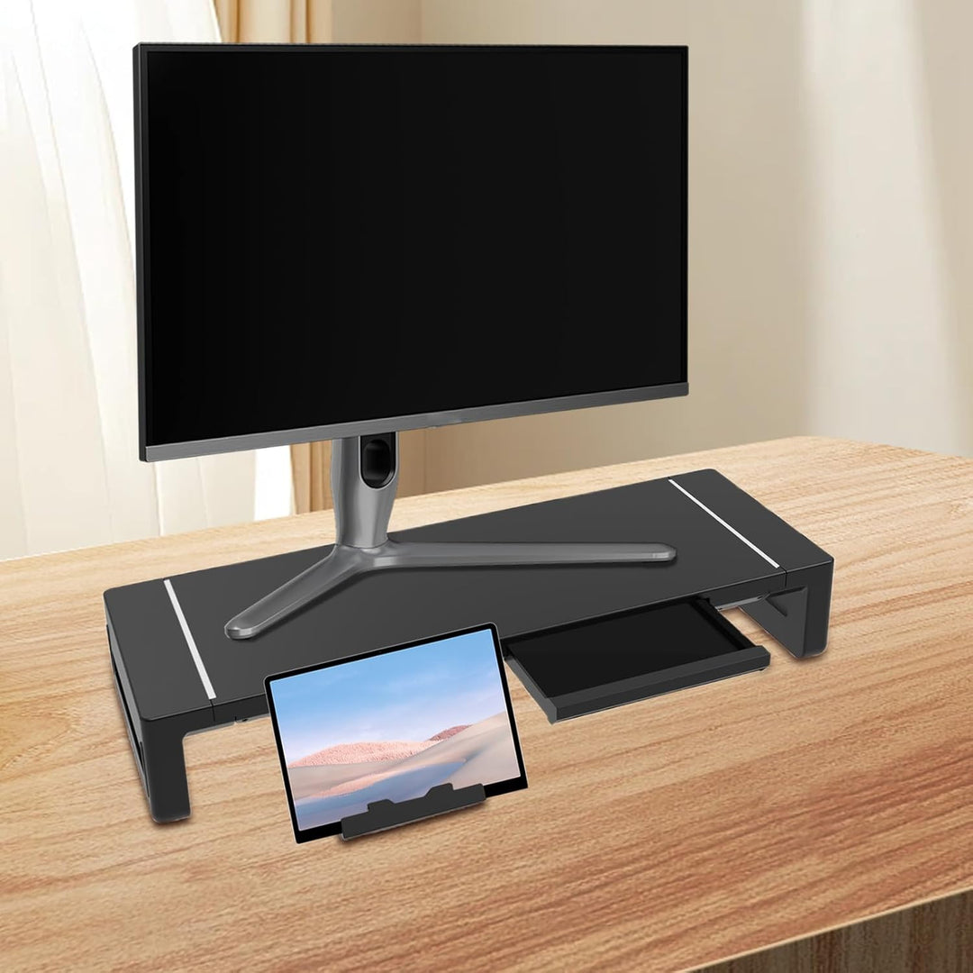 Sturdy black monitor stand with drawer, designed for improved ergonomics in any office