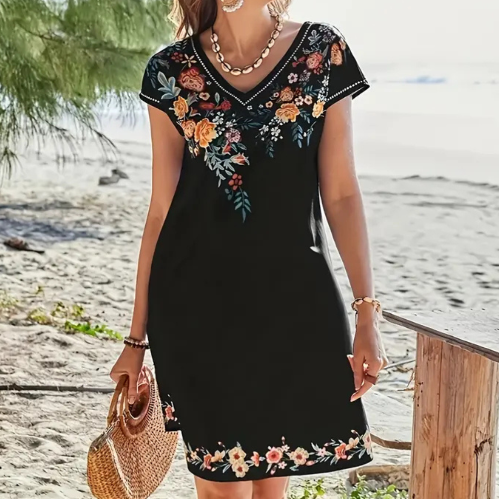 Casual black floral summer dress for women. Short, trendy, and flowy, great for vacation & party.